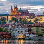 Prague Castle with St. Vitus Cathedral over Lesser town (Mala Strana) at sunset, Czech Republic