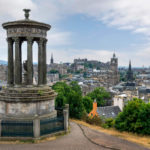 Aerial view of the town and castle  of  Edinburgh with Dugald Stewart monument in Scotland